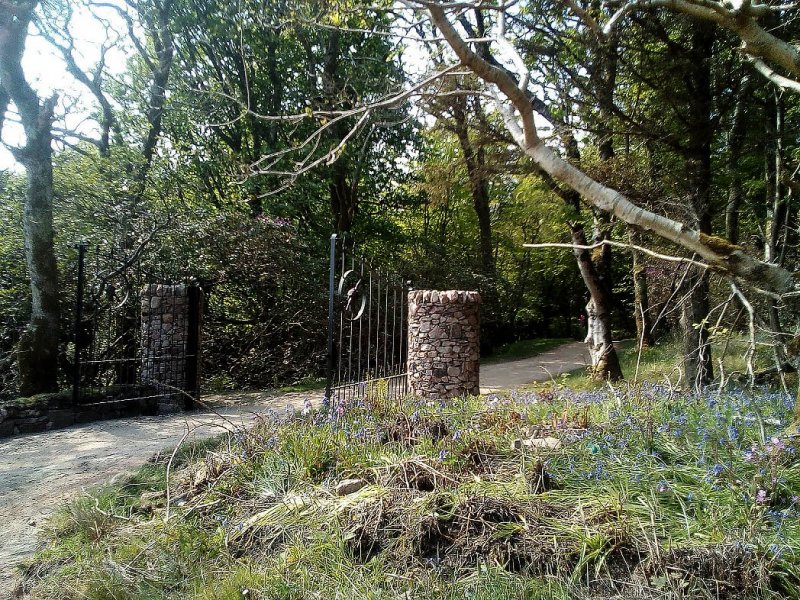 Iron gate and dry stone pillars